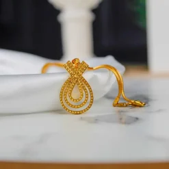 21K Gold Infinite Ribbon Teardrop Pendant - 5.88g - Sultan Gold - تعليقة شريط إنفينيتي مفرغ ذهب عيار 21 - 5.88 غرام - ذهب السلطان