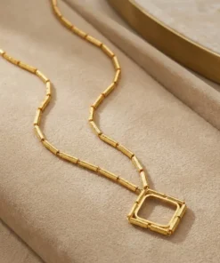 21K Necklace With A Coin Frame - 19.64g