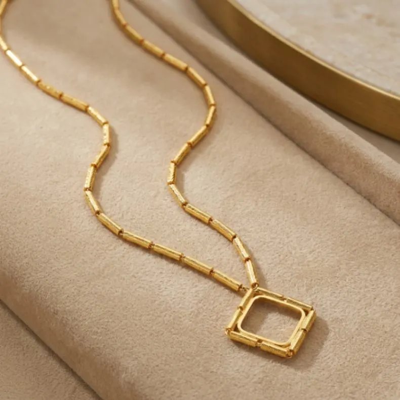 21K Necklace With A Coin Frame - 19.64g